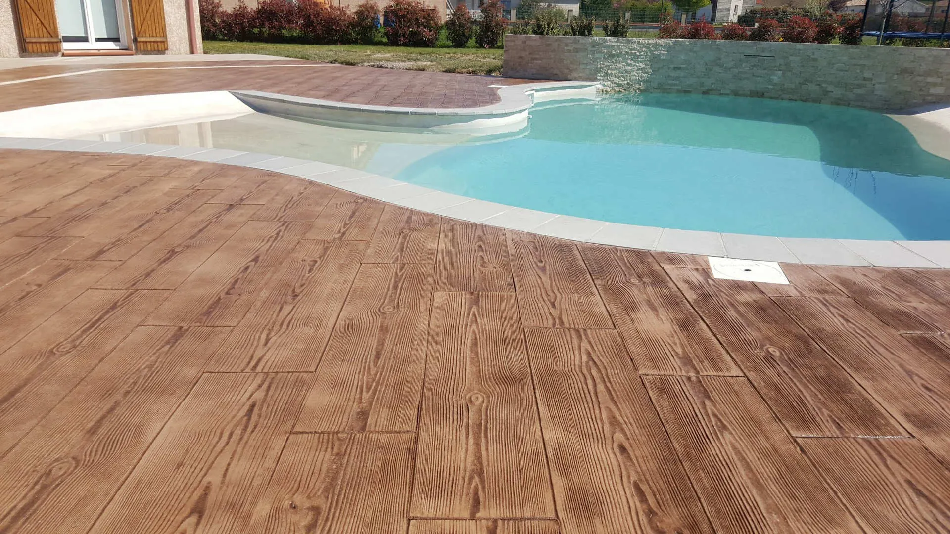 printed concrete paving around the swimming pool printed concrete paving around the swimming pool