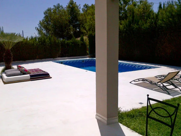 Exterior white microcement flooring terrace