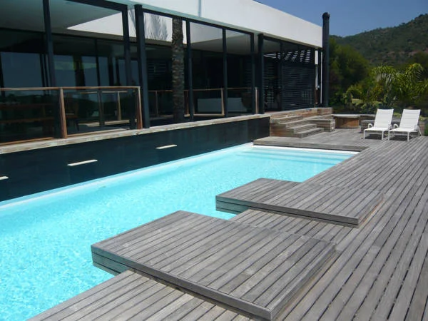 Swimming pool microcement wooden decking